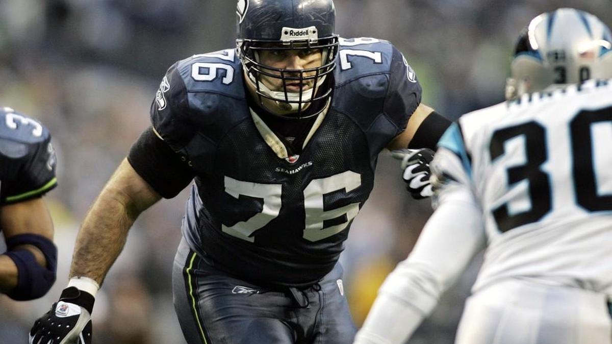 Former Seahawks All-Pro left guard Steve Hutchinson blocks against the Carolina Panthers during the NFC championship football game in Seattle on Jan. 22, 2006. Tuesday, the NFL announced Hutchinson is one of 15 modern-era finalists for induction in the Pro Football Hall of Fame in 2018.