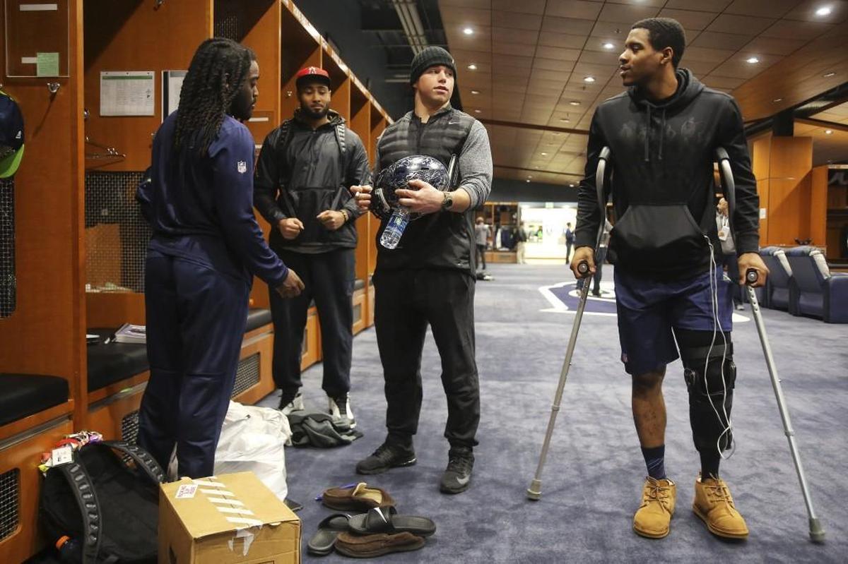 DeShawn Shead on crutches inside the Seahawks’ locker room on the team’s clean-out day in January 2017. Shead, then a starting cornerback for Seattle, tore his anterior cruciate ligament in his knee a couple days earlier in the team’s playoff loss at Atlanta.