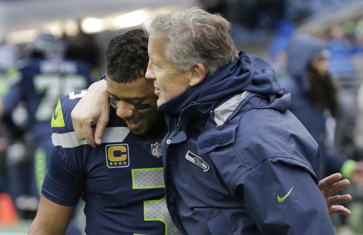 Pete Carroll (right) hugging Russell Wilson during the 2017 season. The coach and quarterback share like minds on the power and supreme value of mental preparation and positivity. They have shared that, really, since the first time they met 7 1/2 years ago in at the Senior Bowl in Mobile, Ala.