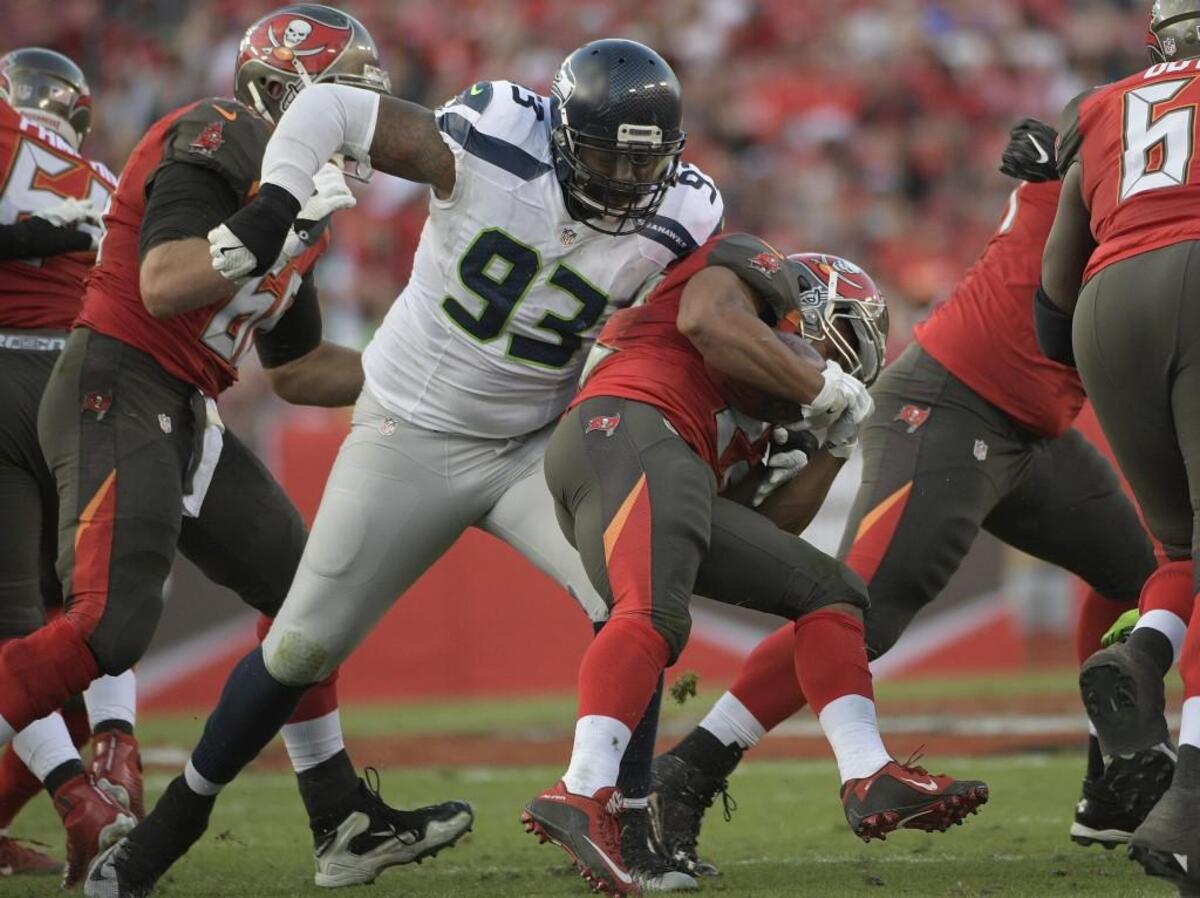 Seahawks run-stopping defensive tackle Tony McDaniel (93) is out of Saturday night’s wild-card playoff game against Detroit with a concussion. Fortunately for Seattle, the Lions don’t run the ball much.