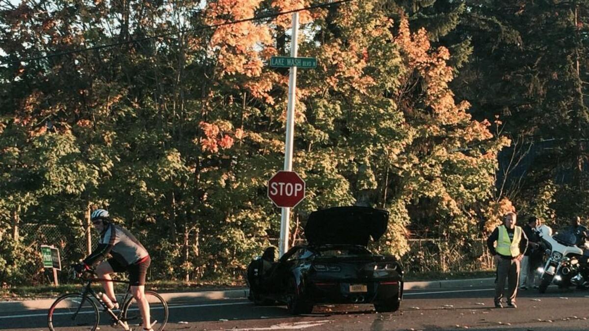 A black Corvette that was being driven by Seattle Seahawks running back Fred Jackson is shown Tuesday, Oct. 20, 2015, after it crashed near the Seahawks’ headquarters in Renton.
