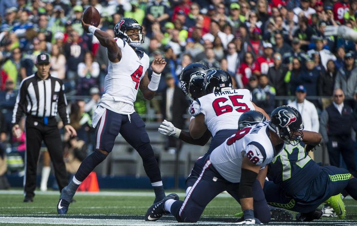 Texans quarterback Deshaun Watson throws a pass in the second quarter. The Seattle Seahawks played the Houston Texans in a NFL football game at CenturyLink Field in Seattle, Wash., on Sunday, Oct. 29, 2017.