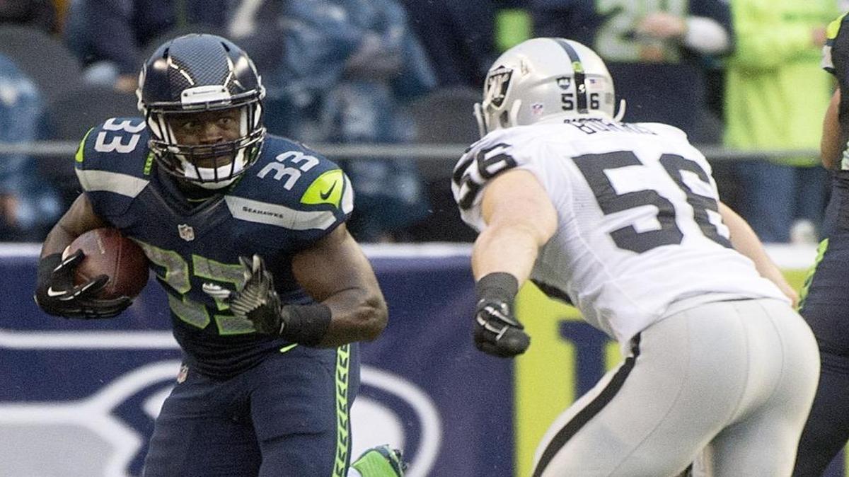 Seahawks running back Christine Michael, who was traded to Dallas in September, re-signed with the team Wednesday and could be the feature back down the stretch.