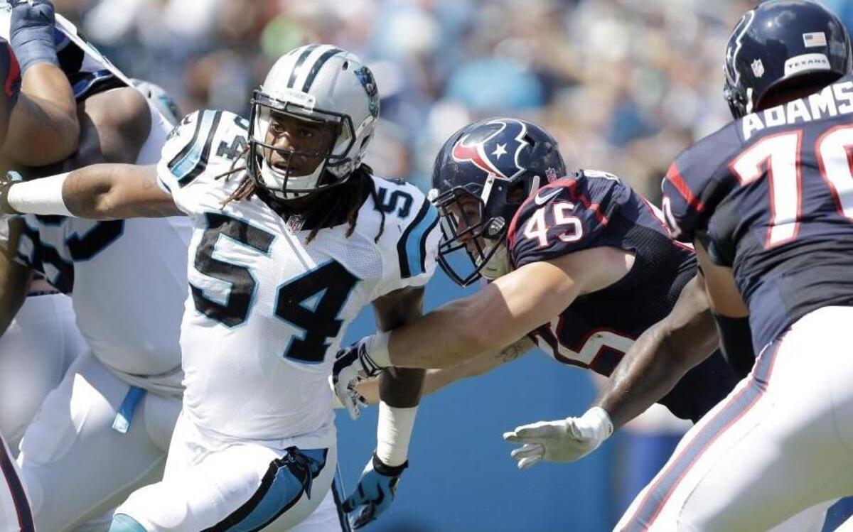 
Carolina linebacker Shaq Thompson (54) pressures the Houston quarterback earlier this season. Thompson, who starred for three years at the University of Washington, said he is excited to face off with Seahawks running back Marshawn Lynch on Sunday.
