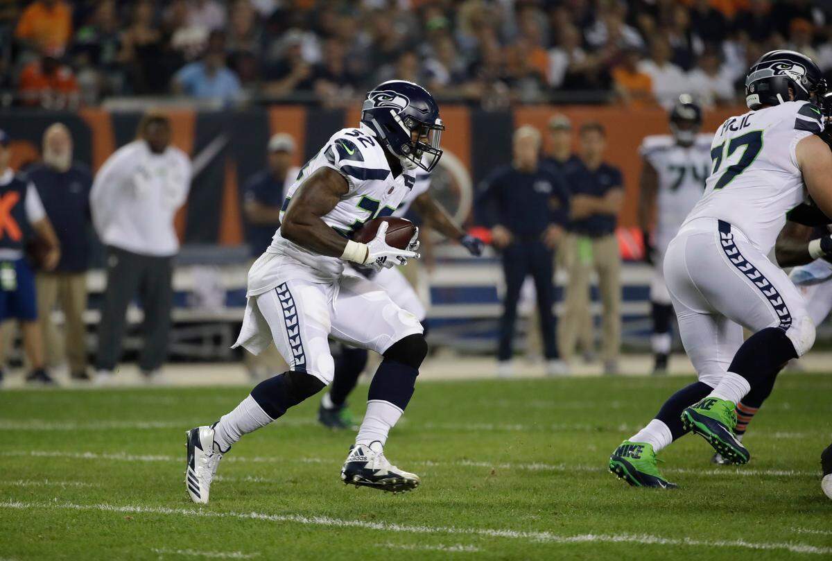 Seahawks lead running back Chris Carson (32) ran three consecutive times, for 13 yards and a first down, on the first three plays Monday night at Chicago. Carson ran it three more times the entire game, and didn’t touch the ball after 11:51 remained in the second quarter of Seattle’s loss to the Bears.