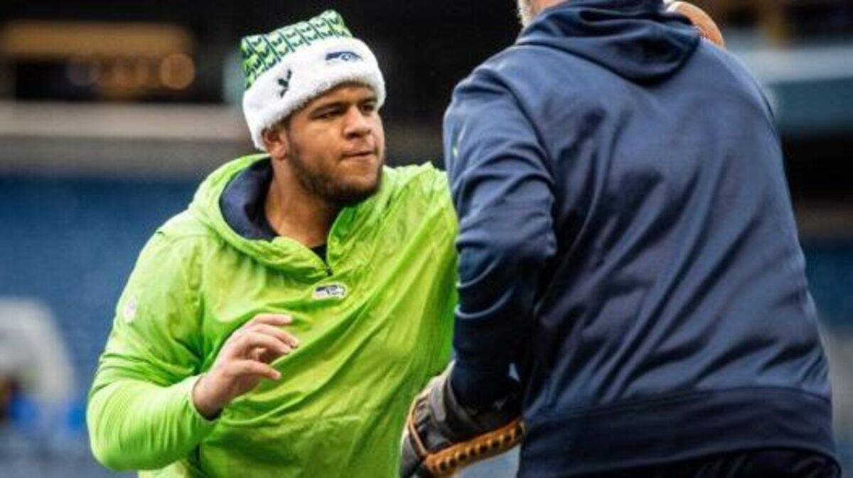 That’s not a Seattle Santa Claus. That’s new Seahawks offensive tackle Elijah Nkansah working during early pregame drills Sunday evening at CenturyLink Field before the team hosted the Kansas City Chiefs. The Seahawks promoted the rookie from Toledo from its practice squad to the active roster on Sunday when they determined starting right tackle Germain Ifedi would not play because of a groin injury he got in practice Thursday.