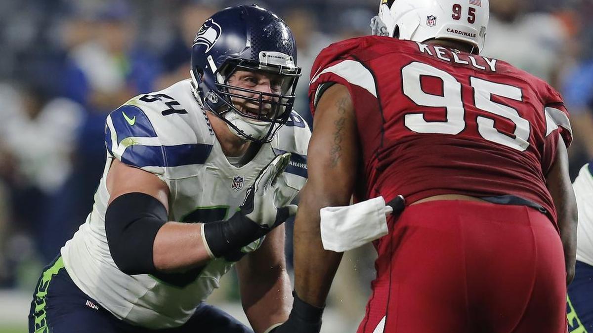 Seattle guard J.R. Sweezy (64)