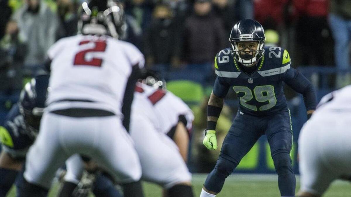 Six-time Pro Bowl free safety Earl Thomas posted on his Instgram account online Wednesday morning he is ending his holdout and reporting to the Seahawks.