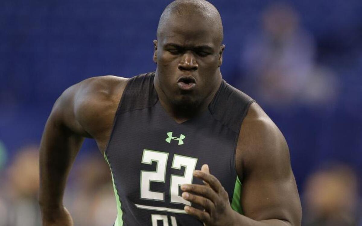 Texas A&M offensive lineman Germain Ifedi runs a drill at the NFL football scouting combine in February.
