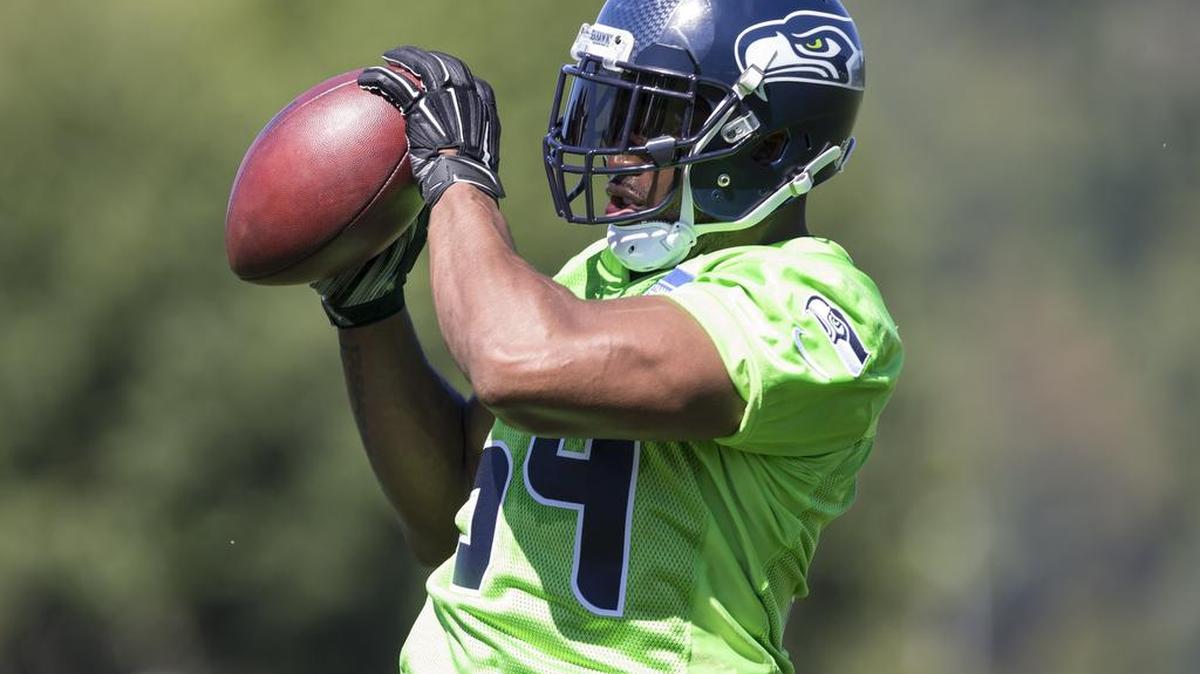 Bobby Wagner catches a ball at drills Friday in Renton. Owner Paul Allen tweeted that his signing was official.