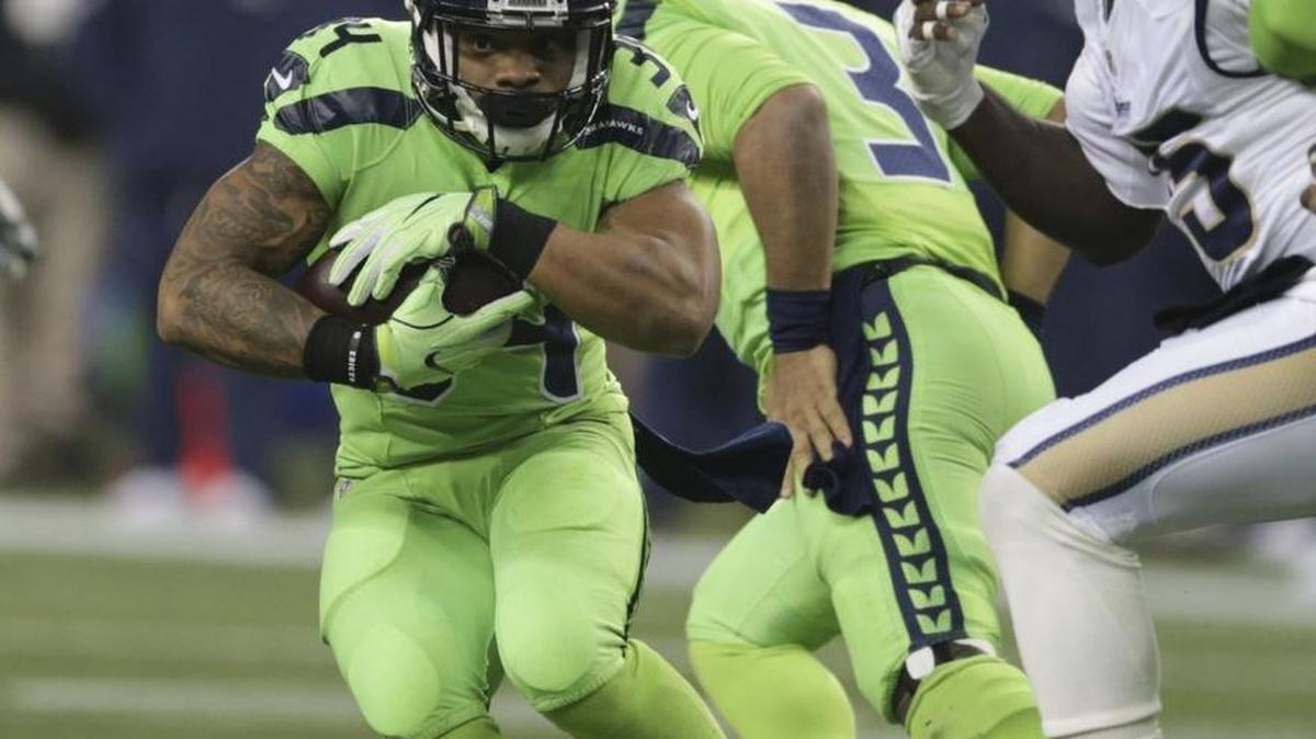 Seattle Seahawks running back Thomas Rawls runs the ball against Los Angeles Rams Dec. 15 in Seattle. Getting Rawls up to speed should be a priority Sunday for the Seahawks.