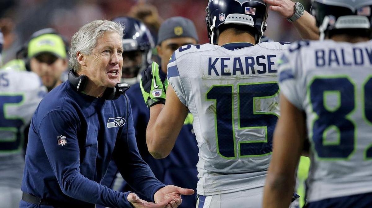 Seattle Seahawks head coach Pete Carroll cheers after a Jermaine Kearse (15) touchdown against the Arizona Cardinals during the first half of an NFL football game, Sunday, Jan. 3, 2016, in Glendale, Ariz.