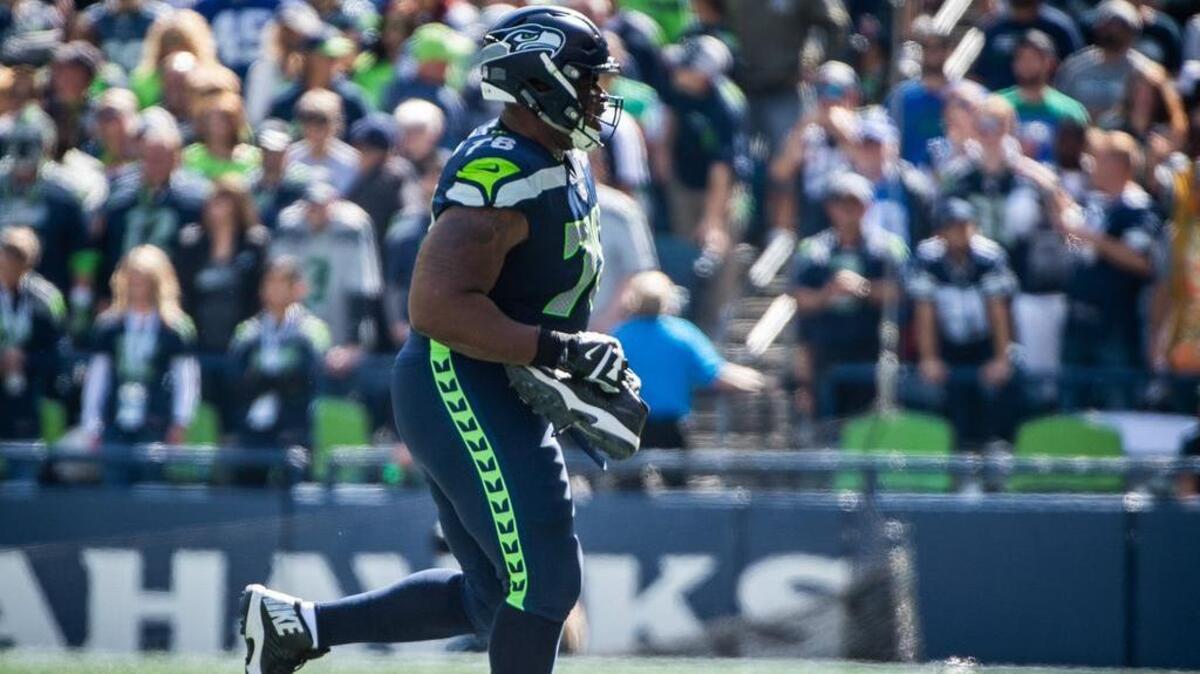 Losing his giant shoe was about the only thing to go wrong for right guard D.J. Fluker in his Seahawks debut last weekend against Dallas. Coach Pete Carroll liked how he and fill-in left guard J.R. Sweezy paired in the win against Dallas that those two are on track to start again Sunday when Seattle plays at Arizona.
