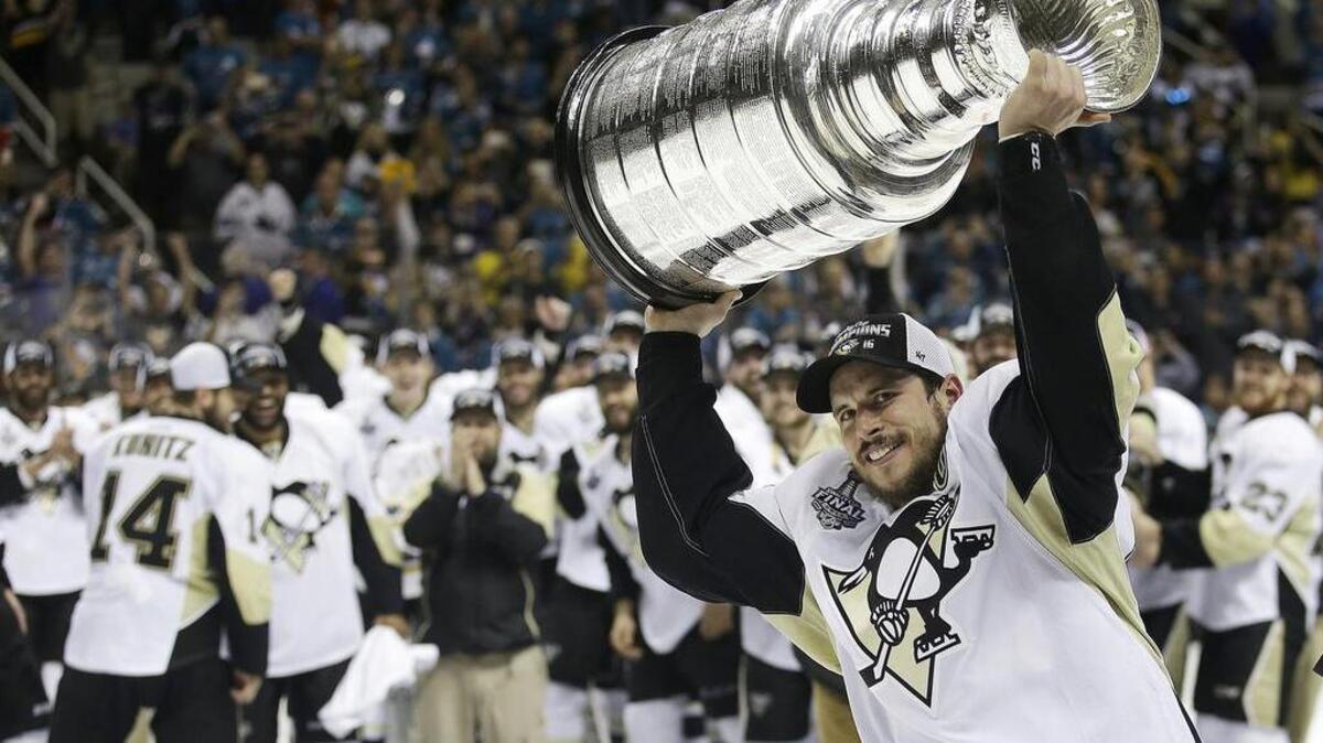 The Penguins’ Sidney Crosby and his teammates celebrate in June after winning the Stanley Cup. The 2016-17 season will start Wednesday. The last back-to-back Cup winners were the Detroit Red Wings in 1997 and 1998.