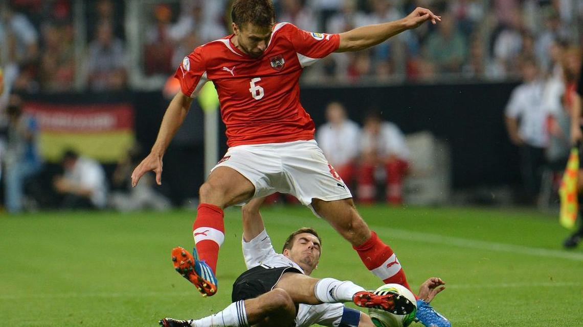
Germany's Philipp Lahm, bottom, and Austria's Andreas Ivanschitz, top, challenges Germany’s Philipp Lahm for the ball during the FIFA World Cup 2014 qualification Group C soccer match in Munich, Germany. Ivanschitz recently joined the Seattle Sounders.
