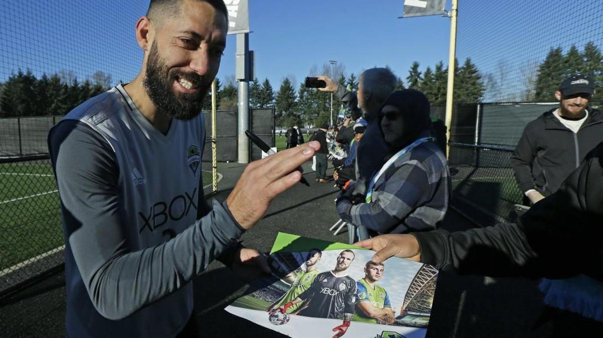 Seattle Sounders forward Clint Dempsey signs autographs in Tukwila last week. On Tuesday, the Sounders announced a new contract with Dempsey for the 2018 season.
