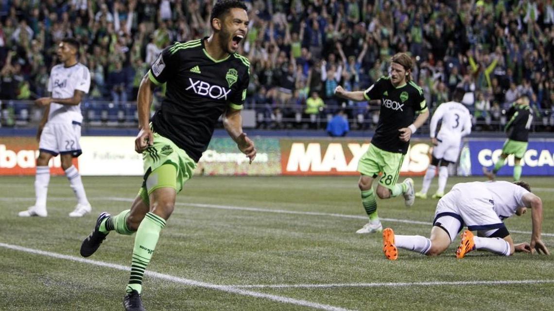 The Sounders traded forward Lamar Neagle, left, to DC United on Monday for allocation money. Neagle, a Federal Way native, is third on the all-time Sounders goal-scoring list.