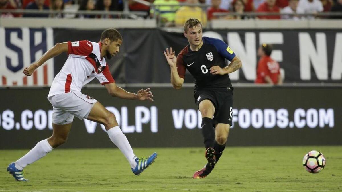 The United States’ Jordan Morris (8) passes the ball away from Trinidad & Tobago’s Radanfah Abu Bakr, left, during a CONCACAF World Cup qualifying match Sept. 6 in Jacksonville, Florida. Morris was one of four Seattle Sounders called to the national team’s camp by coach Bruce Arena on Thursday.