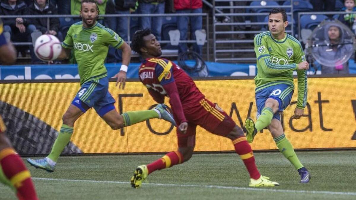 Sounders midfielder Marco Pappa, shown at right in action against Real Salt Lake, was pulled from the MLS re-entry draft and has been reported bound for the Colorado Rapids in a trade.