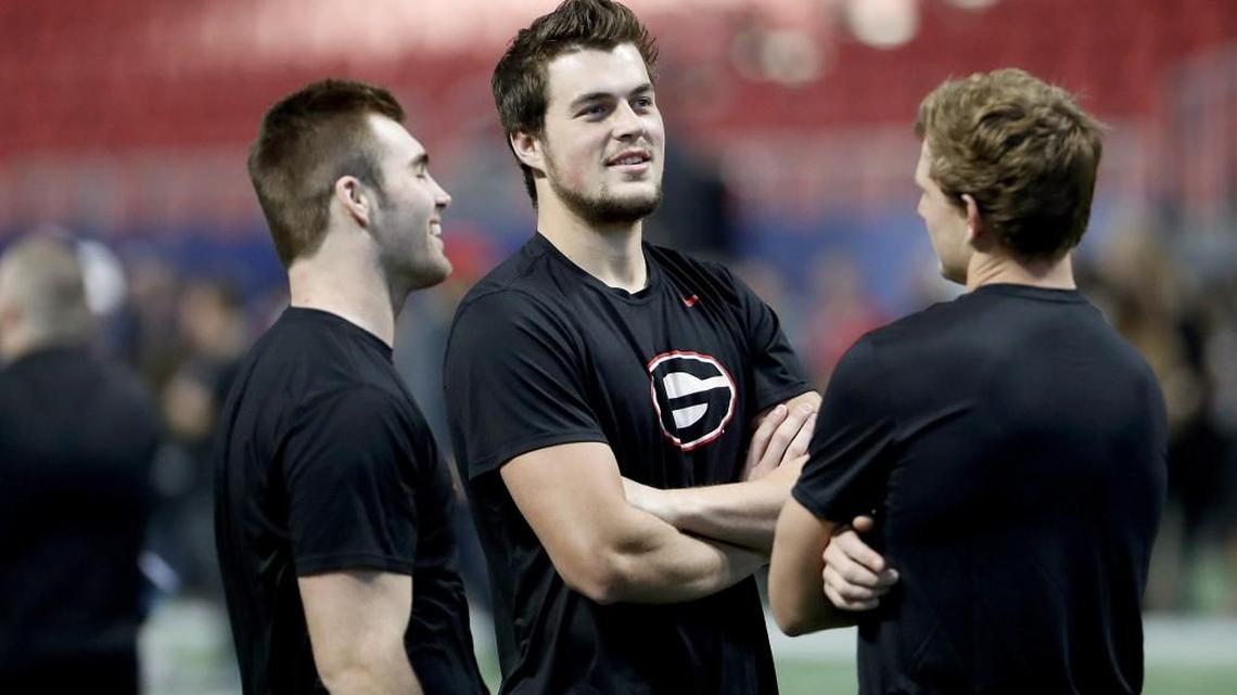 Left watching the title game, Eason has Huskies fans hoping for a homecoming