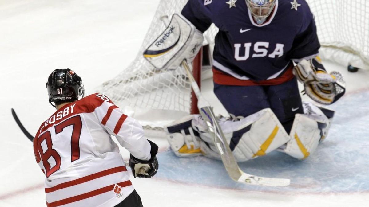 Of all the big events columnist John McGrath has covered, the gold-medal game in the 2010 Winter Olympics in Vancouver, British Columbia, ranks as his No. 1. Above, Canada’s Sidney Crosby (87) slips the winning goal past USA goalie Ryan Miller (39) in overtime.