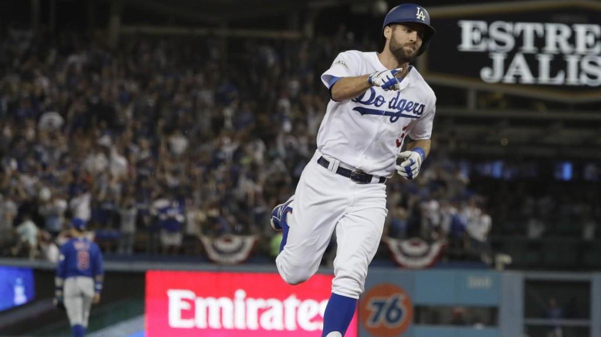 Former Seattle Mariners’ prospect Chris Taylor, shown rounding third after hitting a home run against the Chicago Cubs in the sixth inning during Game 1 of the NLCS, has blossomed with the Los Angeles Dodgers. He batted .288 with 21 homers and 72 RBI during the regular season.