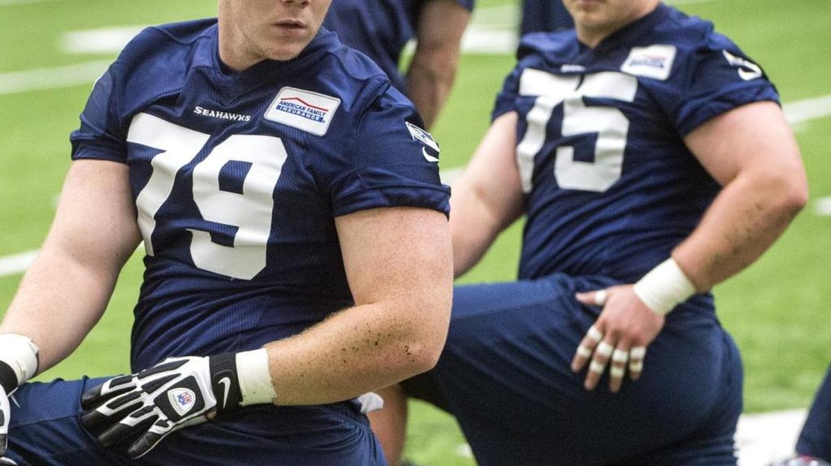 Seahawks added versatile rookie offensive lineman Ethan Pocic of LSU via the draft. At right is lineman Will Pericak.