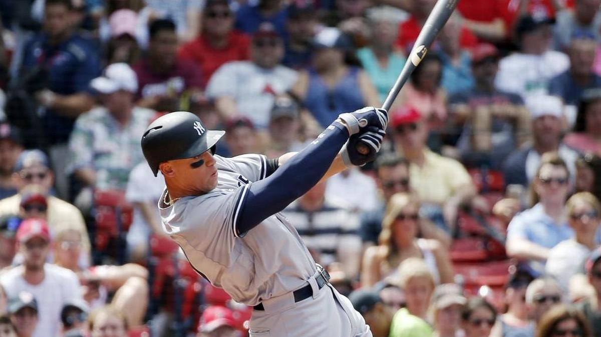 New York Yankees' Aaron Judge swings at a pitch during the seventh inning of the first game of a baseball doubleheader against the Boston Red Sox in Boston, Sunday, July 16, 2017.