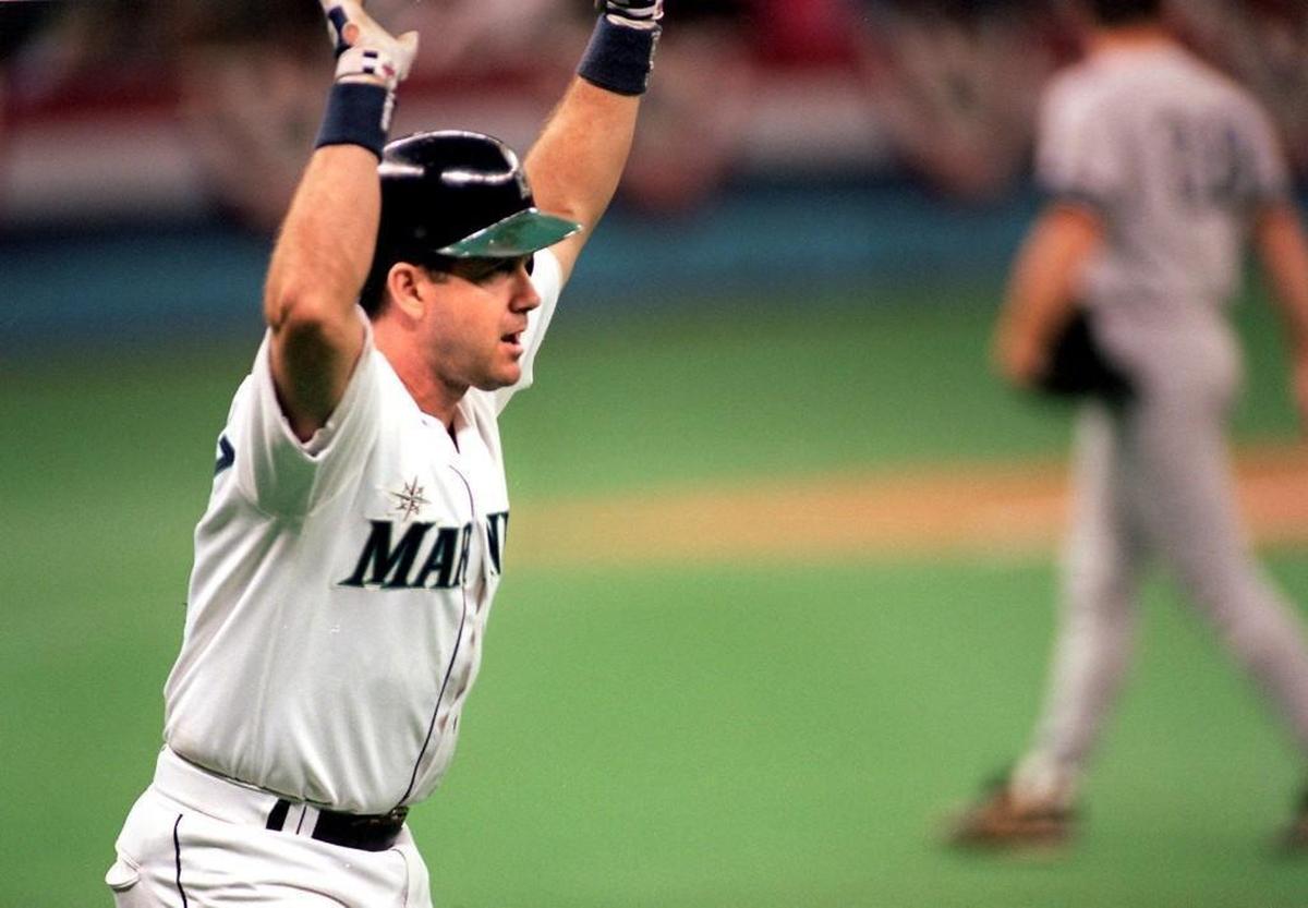 Seattle Mariners designated hitter Edgar Martinez shows his enthusiasm on his way around the bases after hitting a home run against the New York Yankees in the Kingdome.