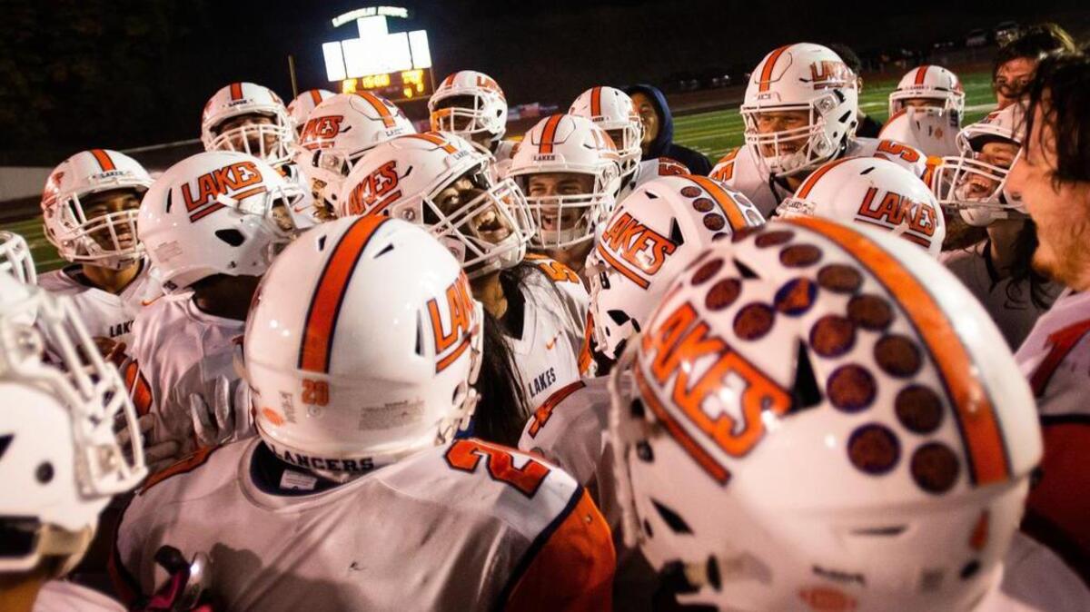 Lakes players celebrate their win against Lincoln. Lincoln high school played Lakes high school in a football game at the Lincoln Bowl in Tacoma, Wash., on Friday, Oct. 19, 2018.