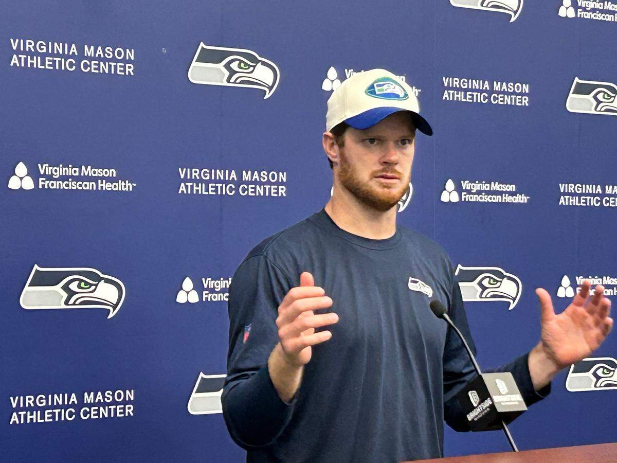 New Seahawks quarterback Sam Darnold talks following the fifth practice of organized team activities (OTAs) at the Virginia Mason Athletic Center in Renton June 4, 2025.