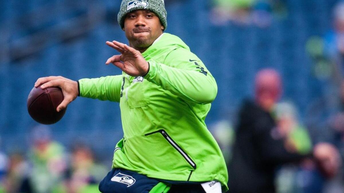 Seahawks quarterback Russell Wilson throws a pass during pregame warmups. The Seattle Seahawks played the Arizona Cardinals in a NFL football game at CenturyLink Field in Seattle, Wash., on Sunday, Dec. 30, 2018.