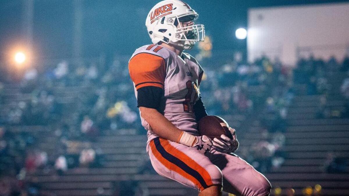 Lakes’ Camyron Gaulke (11) celebrates a touchdown run in the third quarter. Lincoln high school played Lakes high school in a football game at the Lincoln Bowl in Tacoma, Wash., on Friday, Oct. 19, 2018.