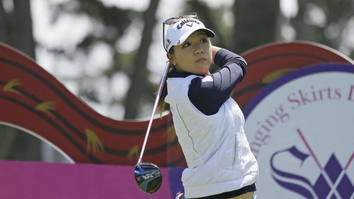 Lydia Ko, of New Zealand, follows her shot from the second tee of the Lake Merced Golf Club during the third round of the Swinging Skirts LPGA Classic golf tournament Saturday, April 23, 2016, in Daly City, Calif.