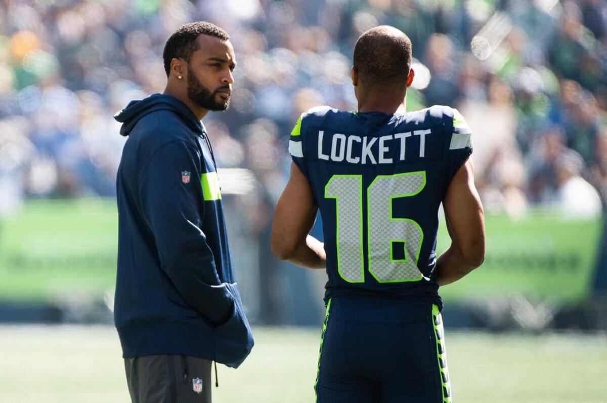 Seahawks wide receiver Doug Baldwin and Seahawks wide receiver Tyler Lockett talk before the game. The Seattle Seahawks played the Dallas Cowboys in a NFL football game at CenturyLink Field in Seattle, Wash., on Sunday, Sept. 23, 2018.