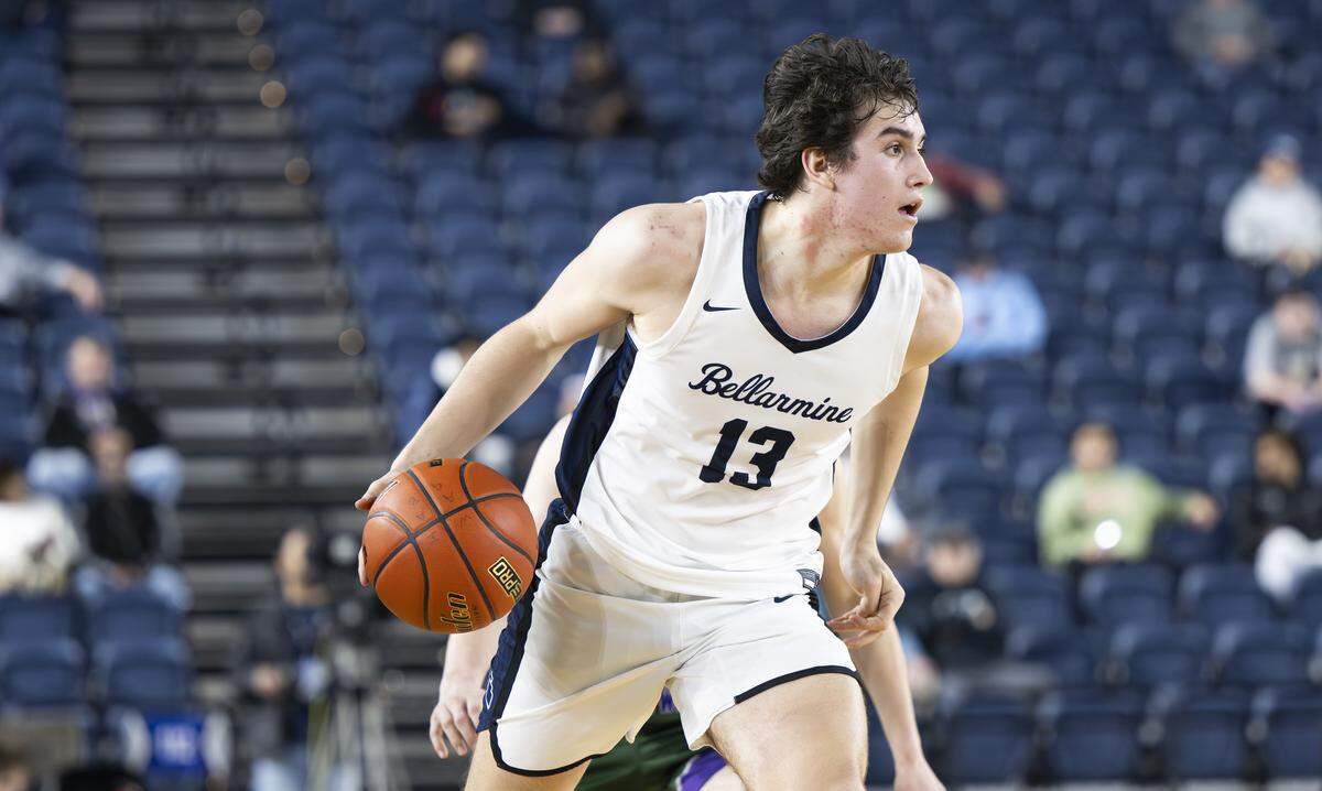 Bellarmine Prep forward Ben Heisel (13) brings the ball up court against Edmonds-Woodway during the quarterfinal round of the 3A State Tournament at the Tacoma Dome, on Thursday, March 5, 2026, in Tacoma, Wash.