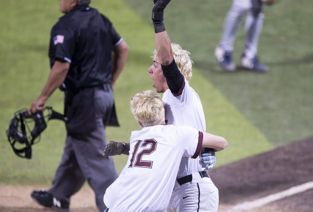 Kentlake reacts to beating Eastside Catholic in the 3A State championship game at Funko Field, on Saturday, May 30, 2026, in Everett, Wash.