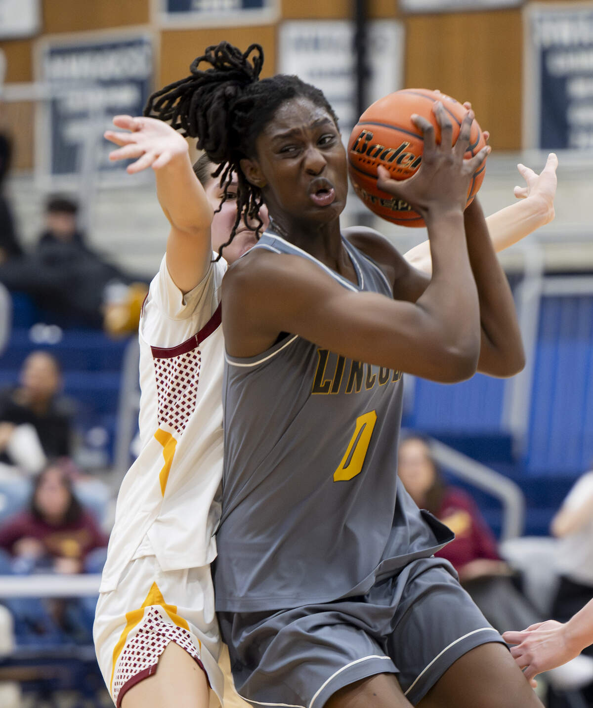 Lincoln forward Oliviyah Edwards (0) cuts underneath against Lakeside during the regional round of the 3A state basketball tournament at Bellevue College, on Saturday, Feb. 28, 2026, in Bellevue, Wash.