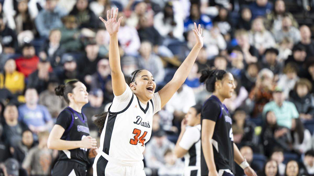 Davis post Aionna Perez (34) reacts to beating Sumner in the Girls 4A State Tournament Championship at the Tacoma Dome, on Saturday, March 7, 2026, in Tacoma, Wash.
