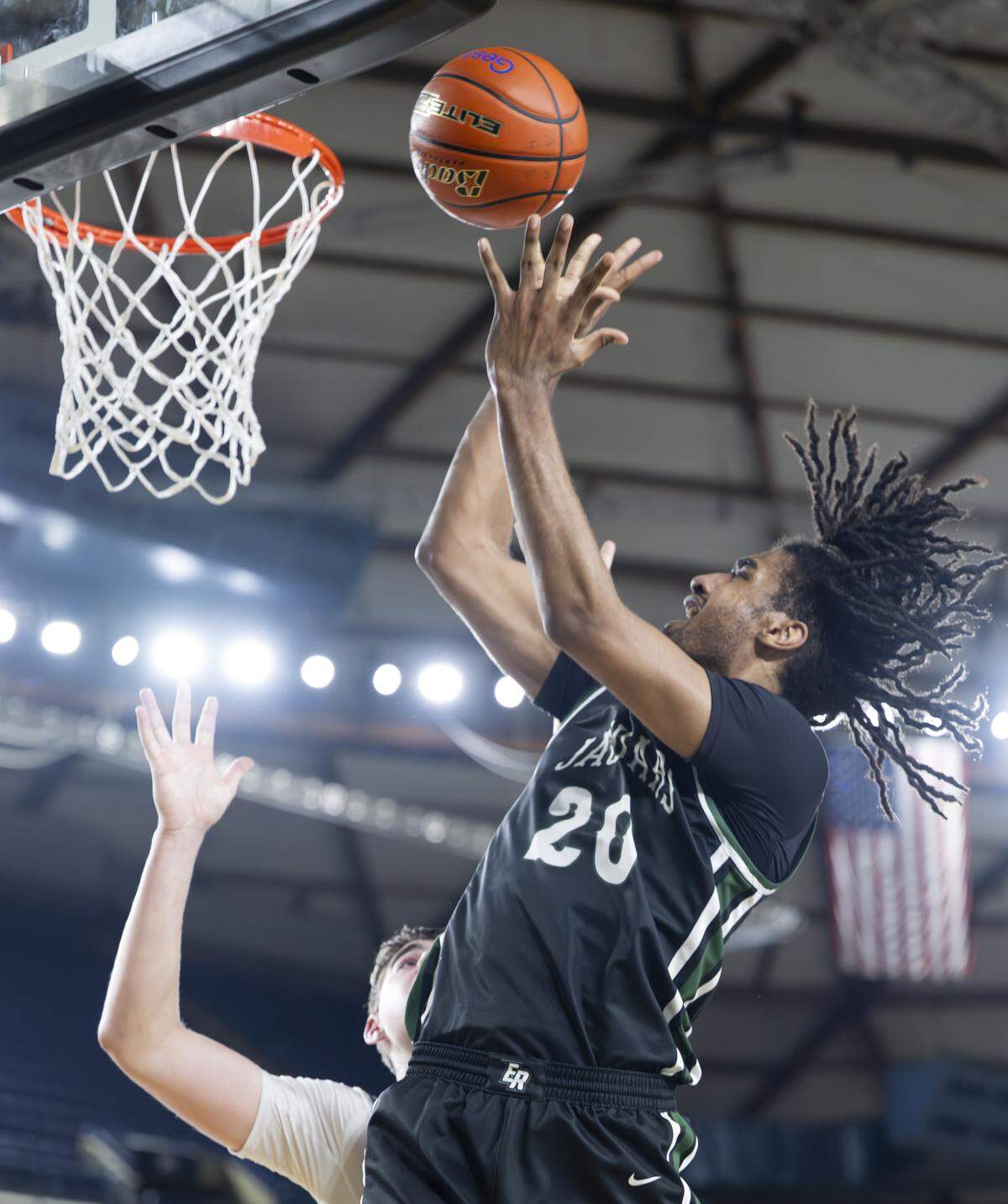 Emerald Ridge forward Jamaize McGriff (20) tries to get a basket against Gonzaga Prep during the semifinal round of the 4A State Tournament at the Tacoma Dome, on Friday, March 6, 2026, in Tacoma, Wash.