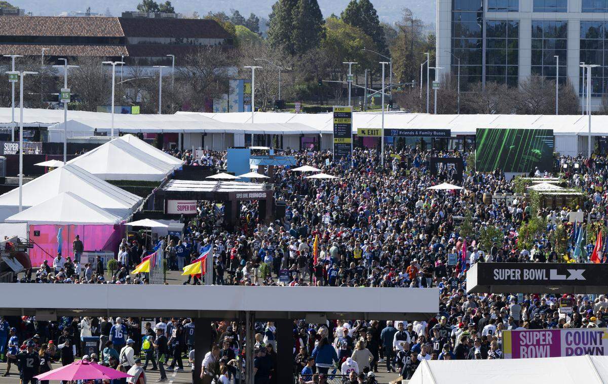 Fans enjoy the Gameday experience and tailgating before Super Bowl LX between the New England Patriots and the Seattle Seahawks at Levi's Stadium on Sunday, Feb. 8, 2026, in Santa Clara, Calif.