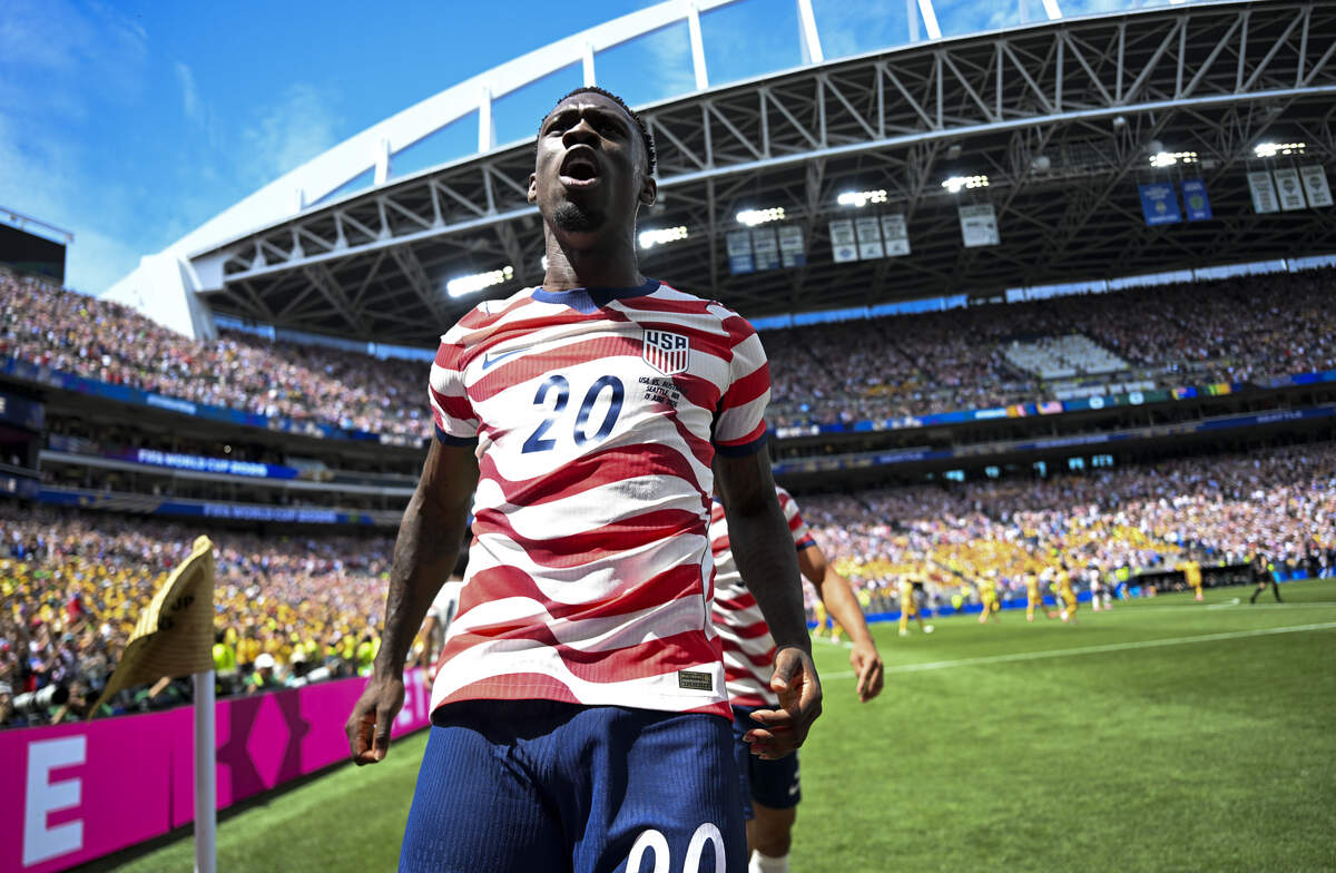 United States of America forward Folarin Balogun (20) reacts to a United States of America goal scored by Australia defender Cameron Burgess (21) during the first half of FIFA World Cup 2026 Group D match at Seattle Stadium in Seattle., on Friday, June 19, 2026, in Seattle.