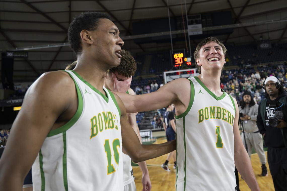 Richland guard Josiah Scacco (10) and Richland guard Landen Northrop (1) react to winning the Boys 4A State Tournament Championship Gonzaga Prep at the Tacoma Dome, on Saturday, March 7, 2026, in Tacoma, Wash.