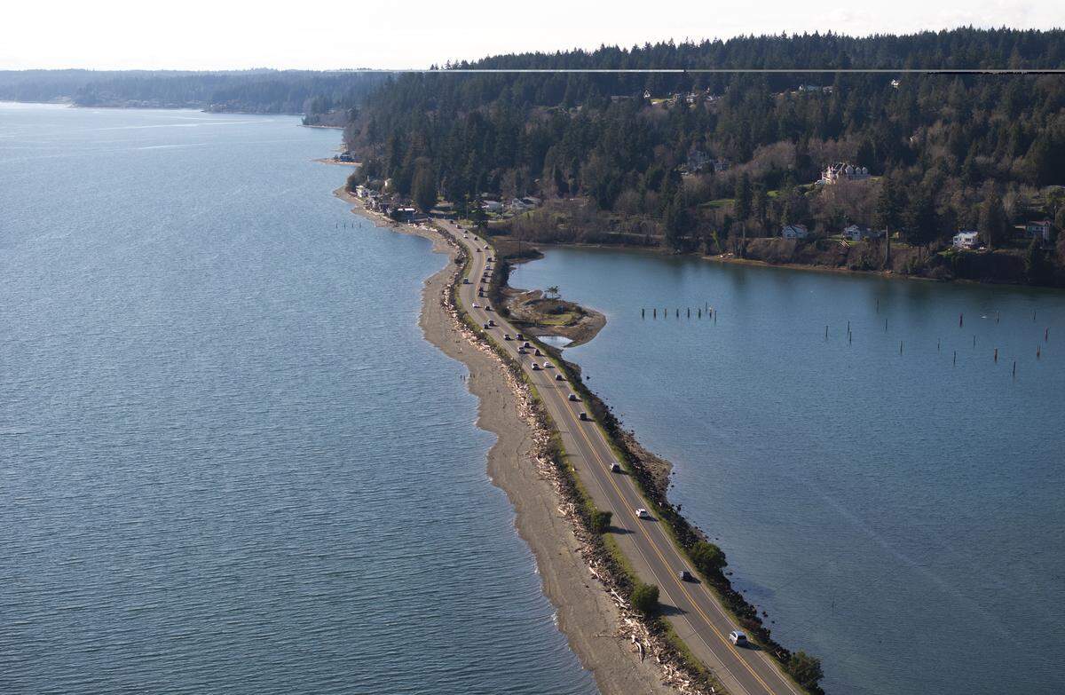 Traffic crosses the Purdy Sand Spit, on Thursday, Feb. 12, 2026, in Purdy, Wash. 