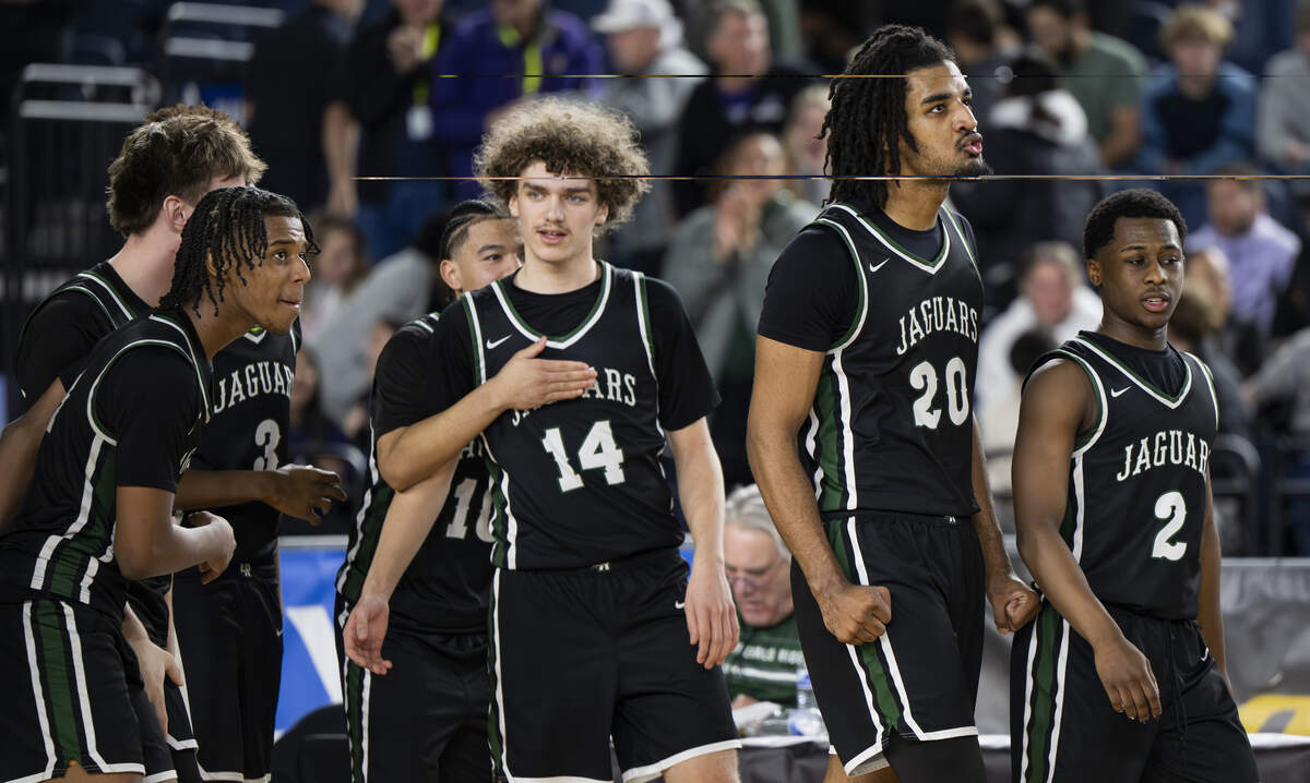 Emerald Ridge reacts to their upset victory against Mount Si during the quarterfinal round of the 4A State Tournament at the Tacoma Dome, on Thursday, March 5, 2026, in Tacoma, Wash.