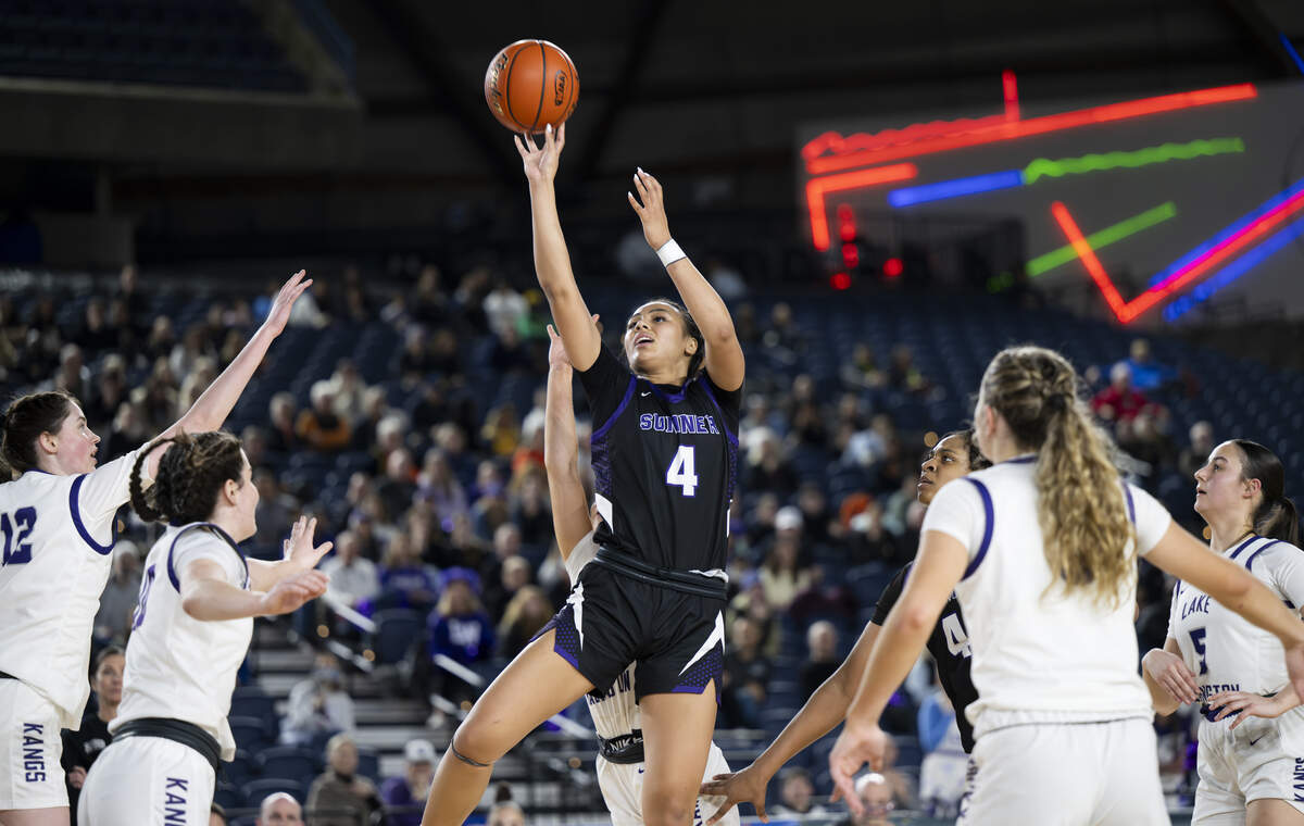 Sumner guard Kawehi Borden (4) shoots the ball against Lake Washington during the semifinal round of the 4A State Tournament at the Tacoma Dome, on Friday, March 6, 2026, in Tacoma, Wash.