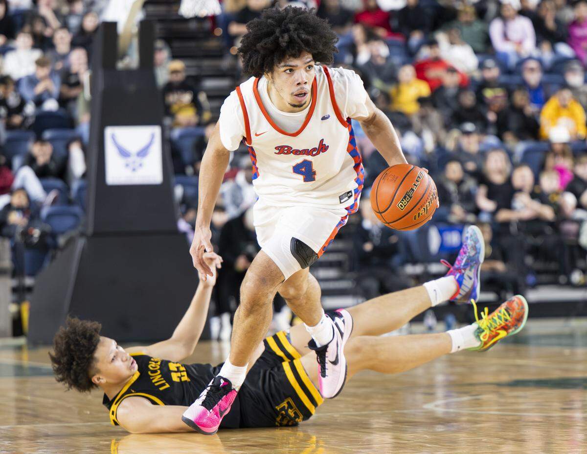 Rainier Beach wing Tyran Stokes (4) dribbles down courtduring the Boys 3A State Tournament Championship at the Tacoma Dome, on Saturday, March 7, 2026, in Tacoma, Wash.