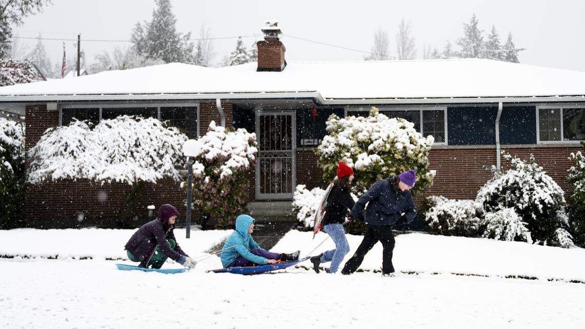 Snow’s aftermath hits Pierce County with slides, outages, closures