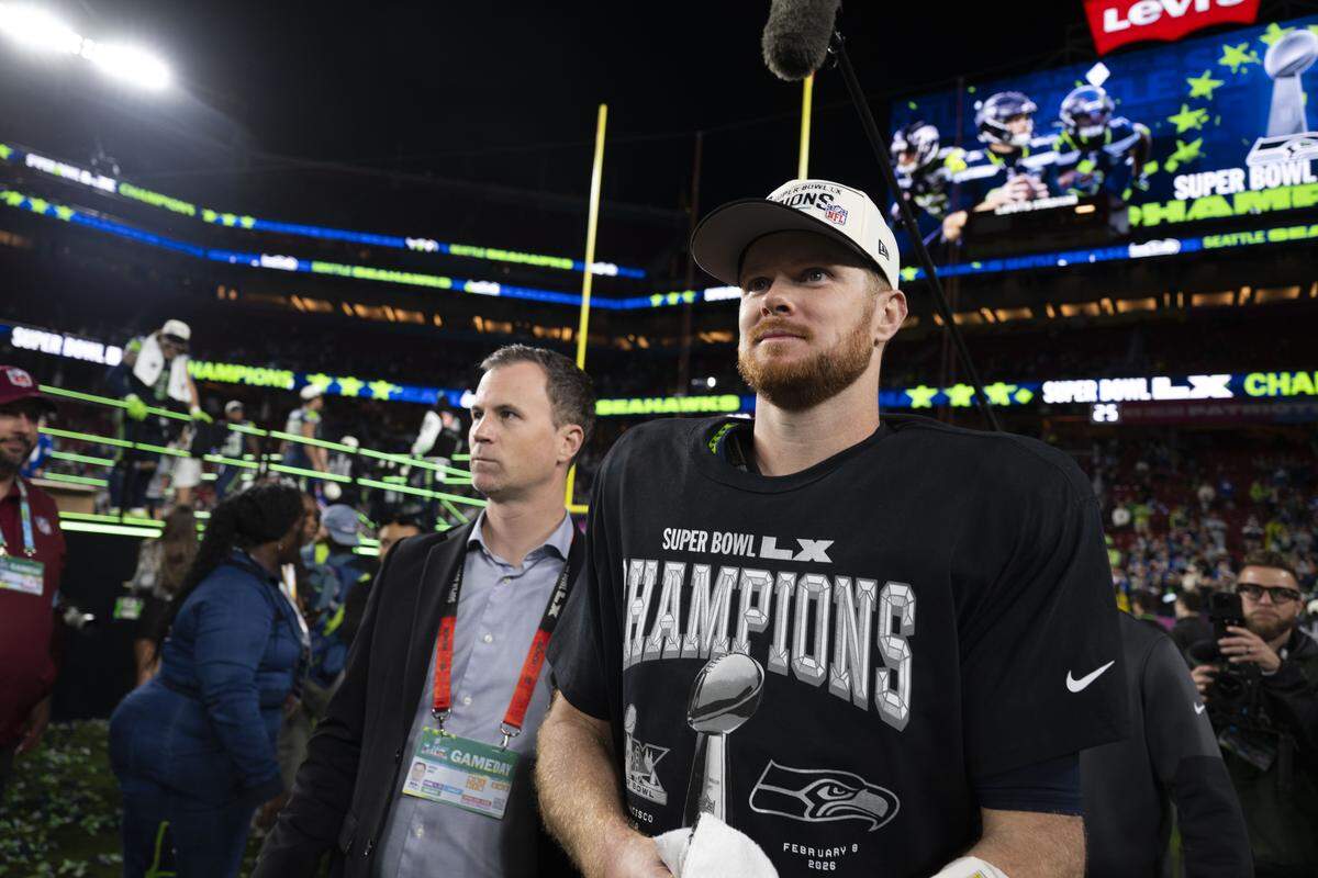 Seattle Seahawks quarterback Sam Darnold (14) walks off after after beating the New England Patriots 29-13 in Super Bowl LX at Levi's Stadium on Sunday, Feb. 8, 2026, in Santa Clara, Calif.