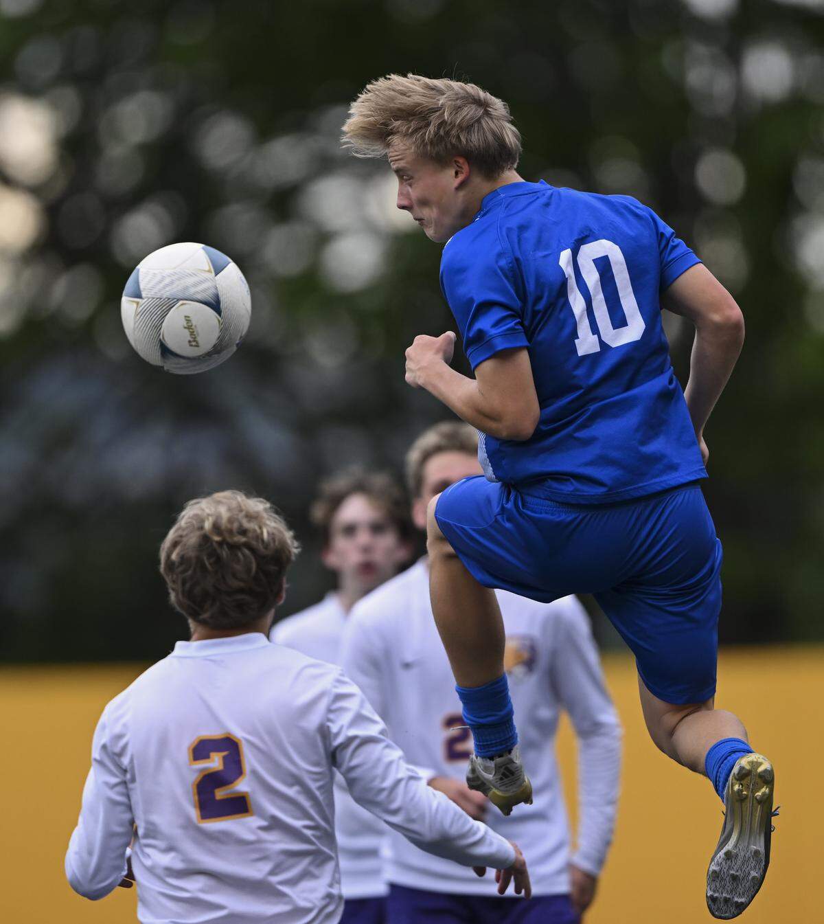 Stadium's Fisher Jarzynka (10) heads the ball against Hanford during the 4A state boys soccer tournament opening round match at Stadium High School, on Tuesday, May 19, 2026, in Tacoma.
